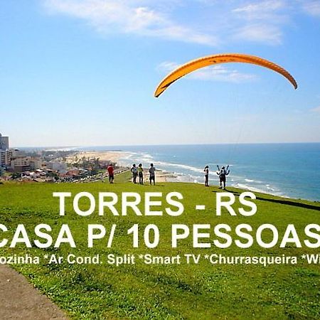 Вілла Casa De 2 Quartos Com 2 Ares-Condicionados Em Torres-Rs - Na Mais Bela Praia Gaucha - Cozinha - Banheiro - Tv Smart 32 E Wi-Fi - Estacionamento - Anfitria Superhost No Bnb Екстер'єр фото