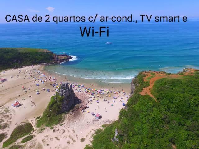Вілла Casa De 2 Quartos Com 2 Ares-Condicionados Em Torres-Rs - Na Mais Bela Praia Gaucha - Cozinha - Banheiro - Tv Smart 32 E Wi-Fi - Estacionamento - Anfitria Superhost No Bnb Екстер'єр фото