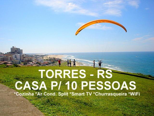 Вілла Casa De 2 Quartos Com 2 Ares-Condicionados Em Torres-Rs - Na Mais Bela Praia Gaucha - Cozinha - Banheiro - Tv Smart 32 E Wi-Fi - Estacionamento - Anfitria Superhost No Bnb Екстер'єр фото